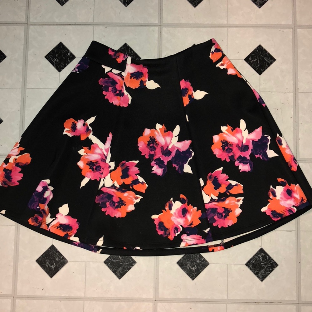 Size Women’s medium black with floral skirt